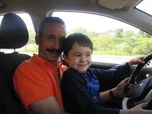 Cousin Orly Milián the Magnificent and “Tato” behind the wheel of a state rental car, 2013